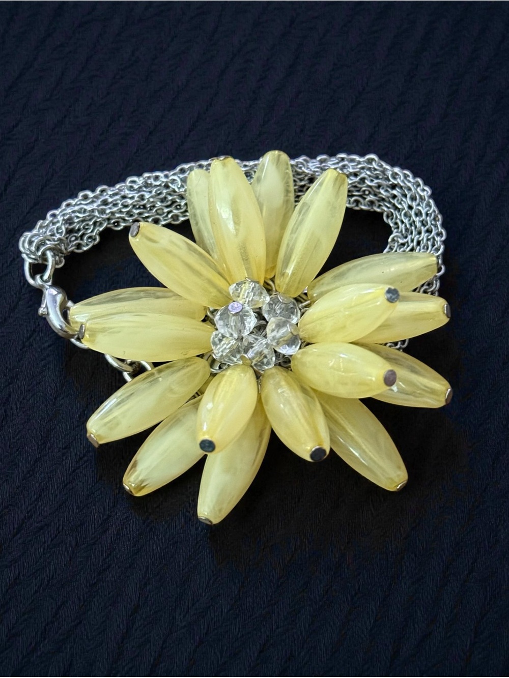 Silver tone yellow daisy bracelet